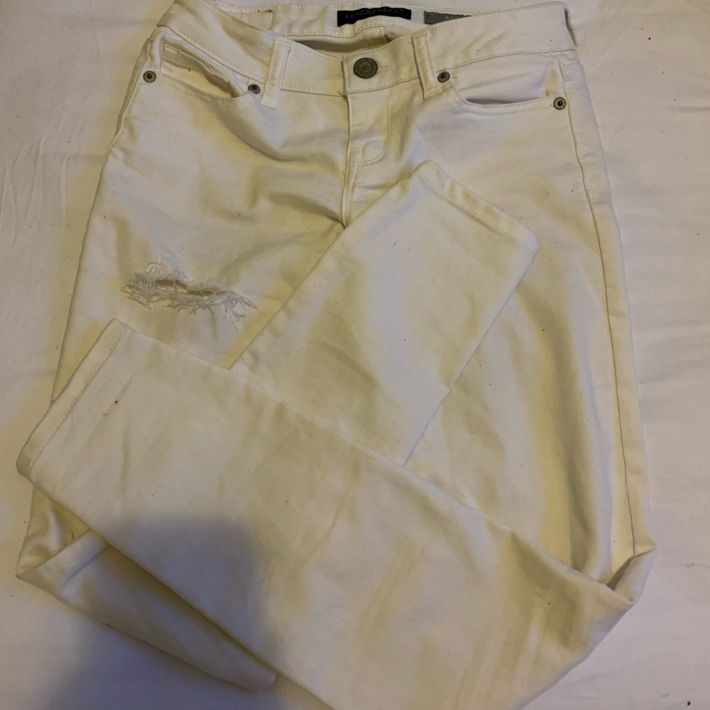 White ripped jeans